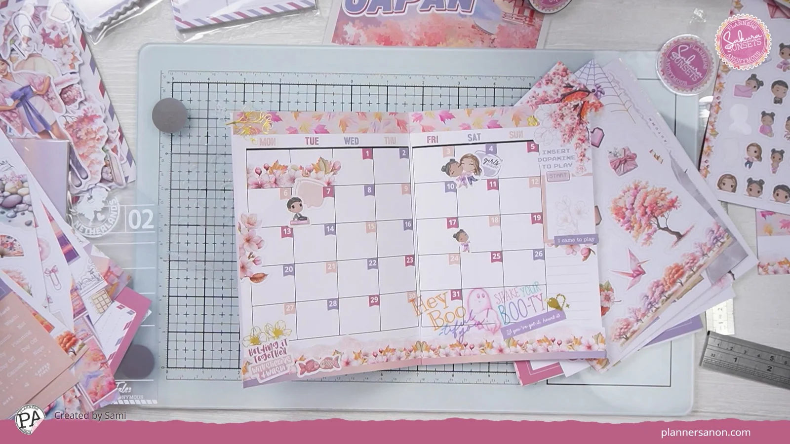 PC06 Sakura Sunsets: Sami decorates a planner spread with seasonal embellishments